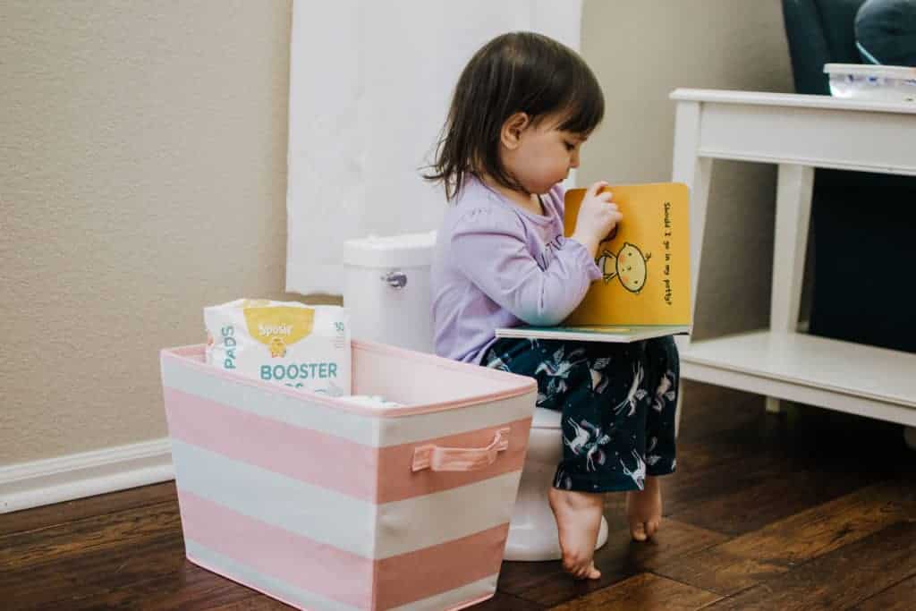 toddler girl on potty