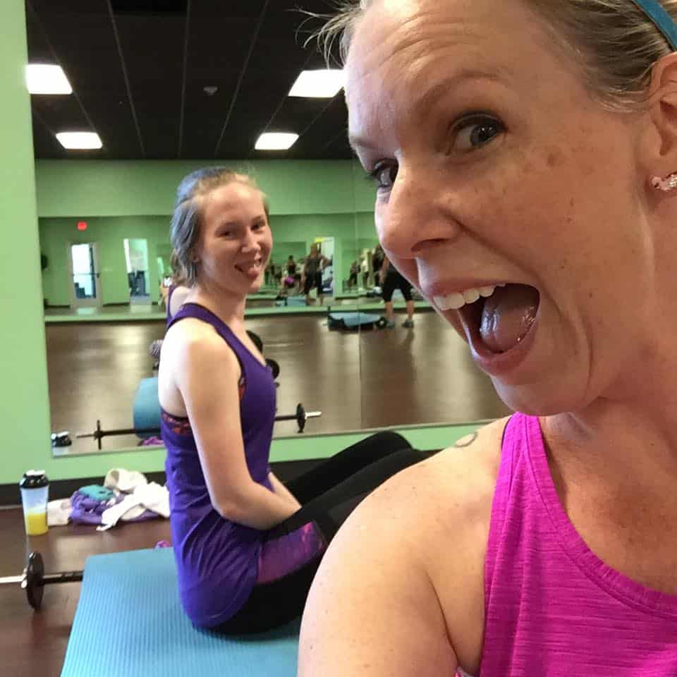 mom and daughter at bodypump class